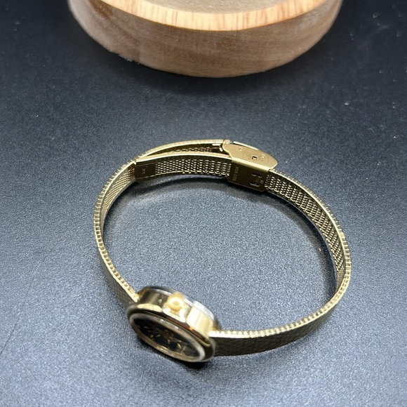 Pretty ladies Timex watch. Gold tone with black face. Not tested, needs battery. - Picture 2 of 4